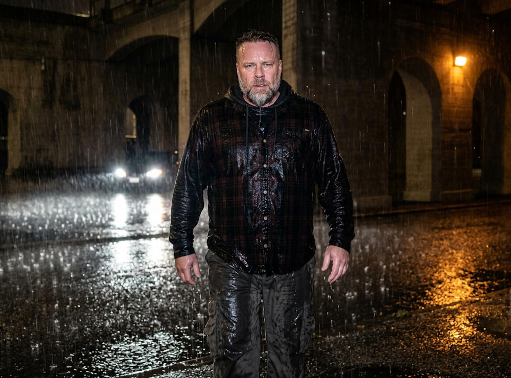 Brian Poulsen soaked in the rain